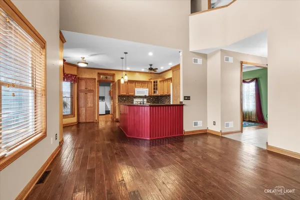 a view of a bathroom with a tub and shower