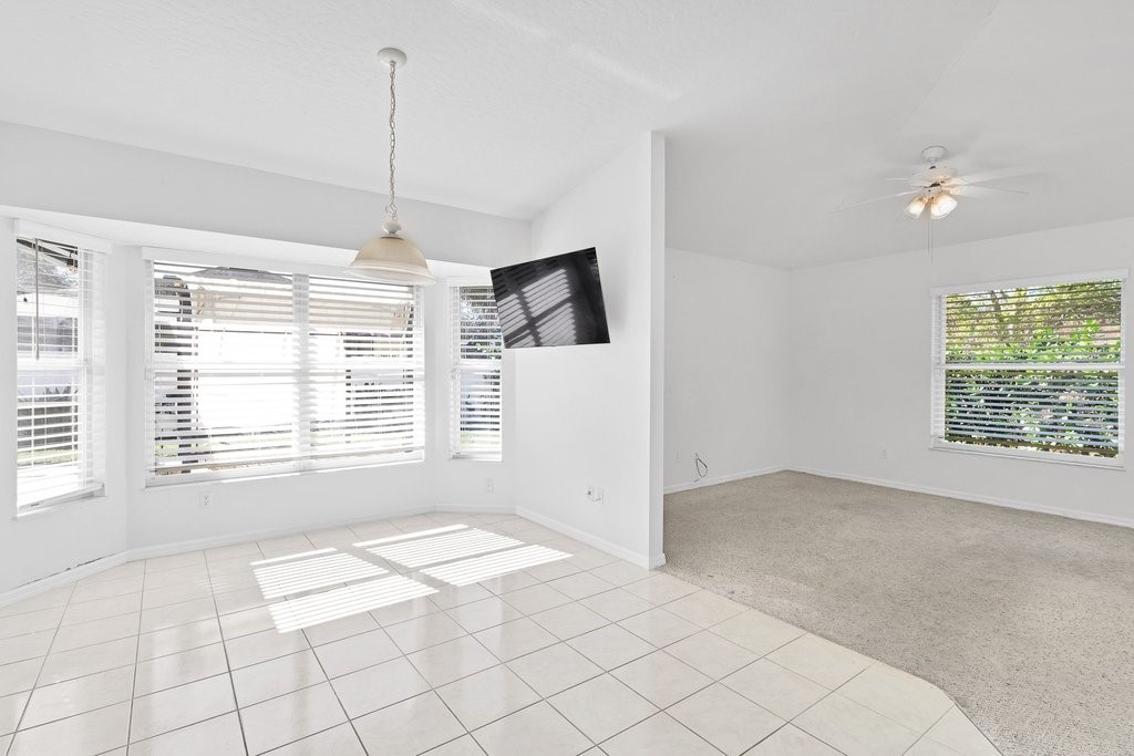 738 Benedictine Terrace Sebastian, FL 32958 - Photo 12 of 33 a view of an empty room with a window