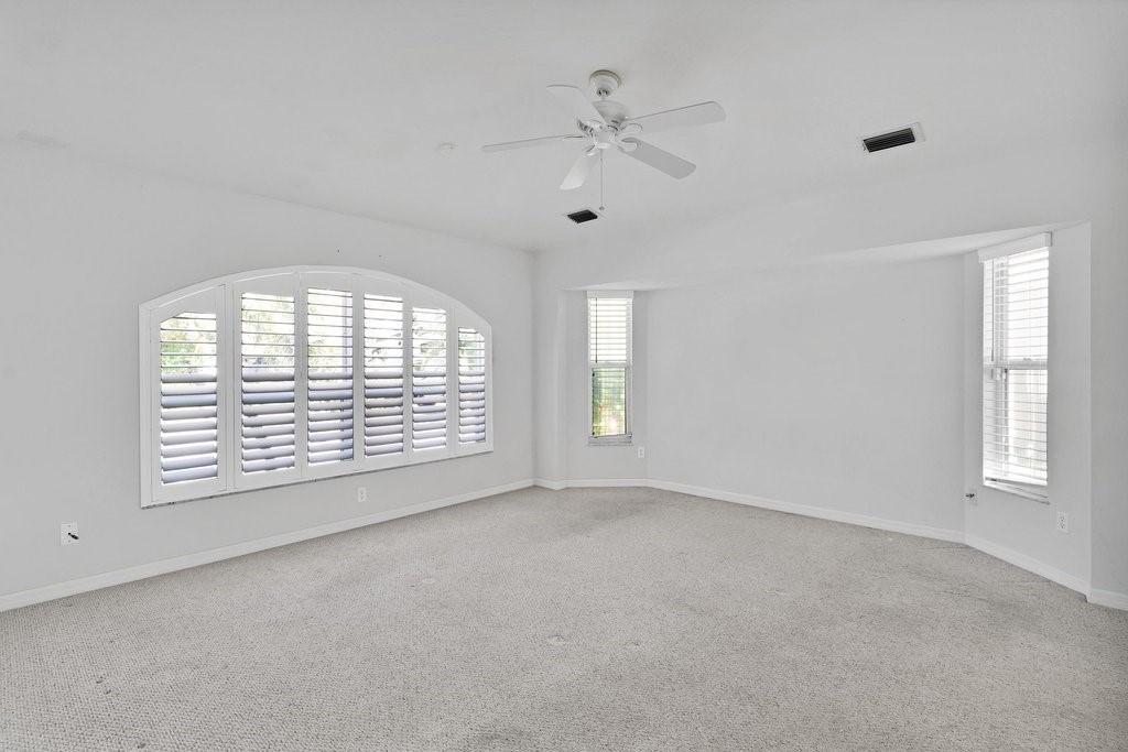 738 Benedictine Terrace Sebastian, FL 32958 - Photo 14 of 33 a view of an empty room with a window