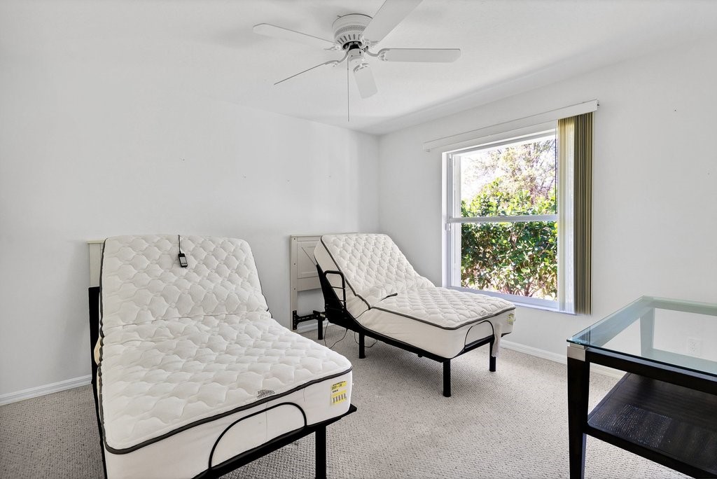 738 Benedictine Terrace Sebastian, FL 32958 - Photo 19 of 33 a living room with furniture and a window