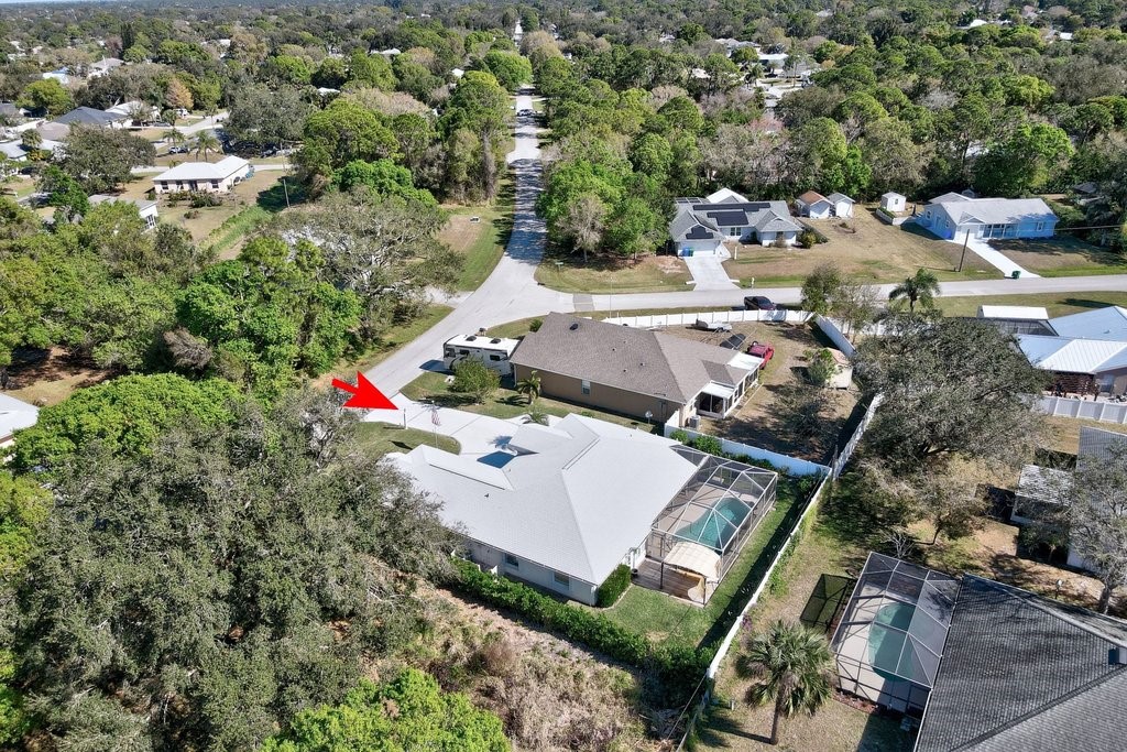 738 Benedictine Terrace Sebastian, FL 32958 - Photo 31 of 33 an aerial view of a houses with outdoor space