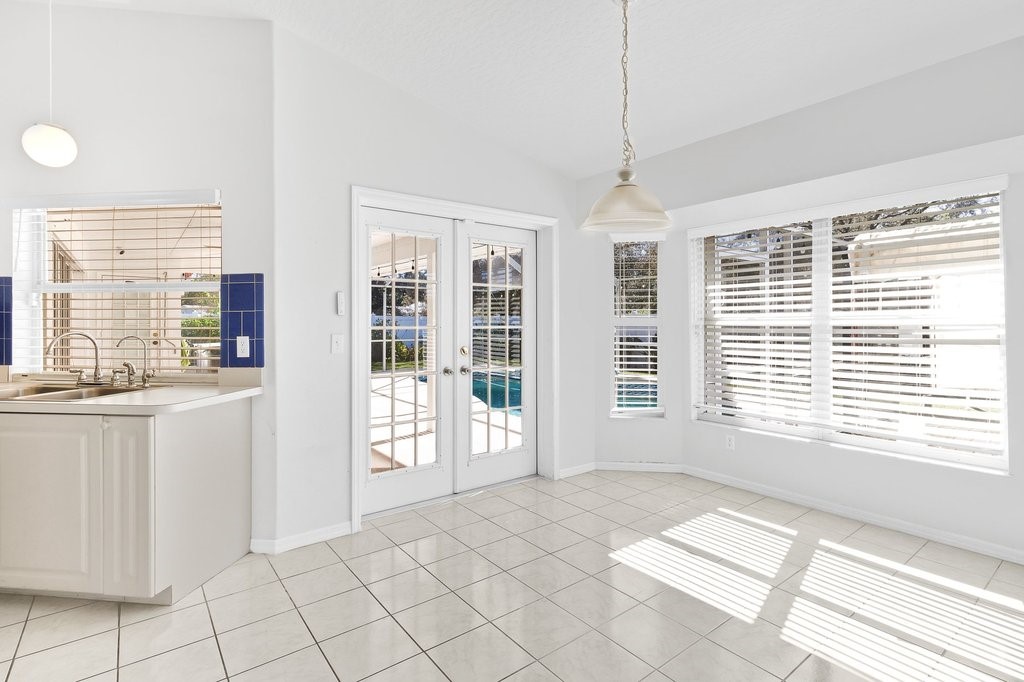 738 Benedictine Terrace Sebastian, FL 32958 - Photo 7 of 33 a view of an empty room with a window