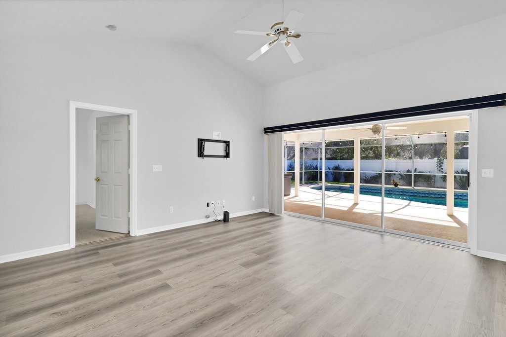738 Benedictine Terrace Sebastian, FL 32958 - Photo 9 of 33 a view of an empty room with a window