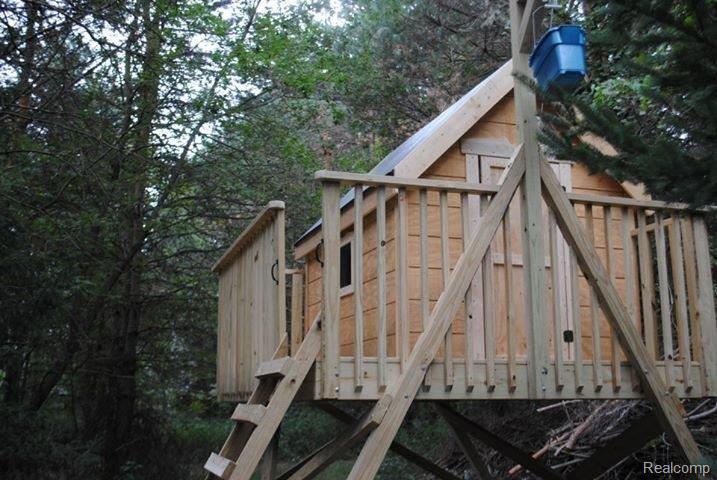 3021 Brewer Road Howell, MI 48855 - Photo 9 of 23 Tree house in woods