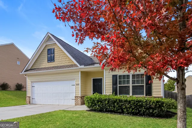 front view of a house with a yard