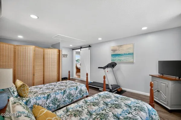 a view of a backyard with swimming pool