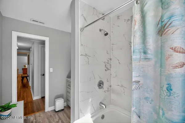 a view of a house with pool and a yard