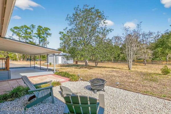 a view of outdoor space yard and swimming pool