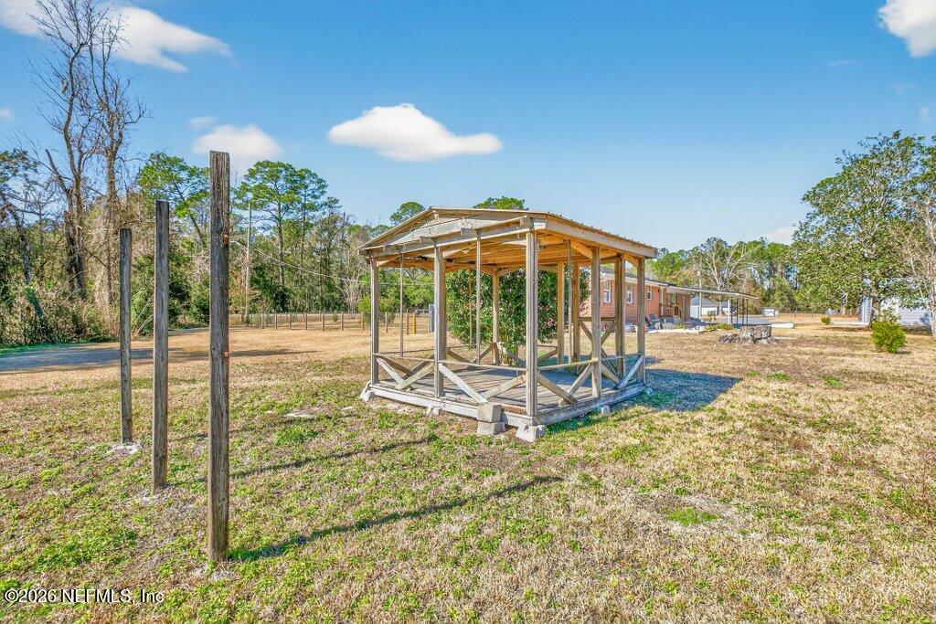 11049 Old Kings Road Jacksonville, FL 32219 - Photo 39 of 74 Pergola/firewood stand