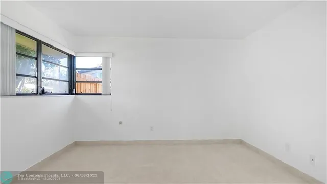 a bathroom with a shower sink and mirror