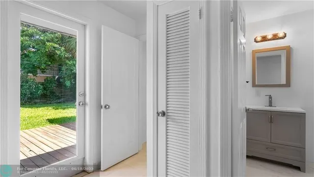 a view of an empty room with a window