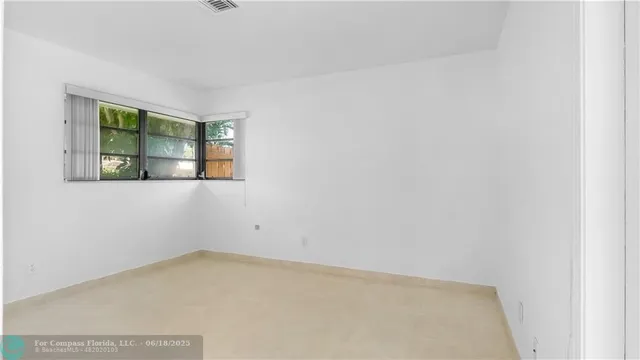 an empty room with a window