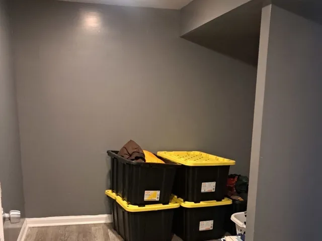 a view of small space with table and chairs