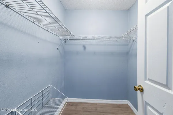 a view of small space with racks on the wall