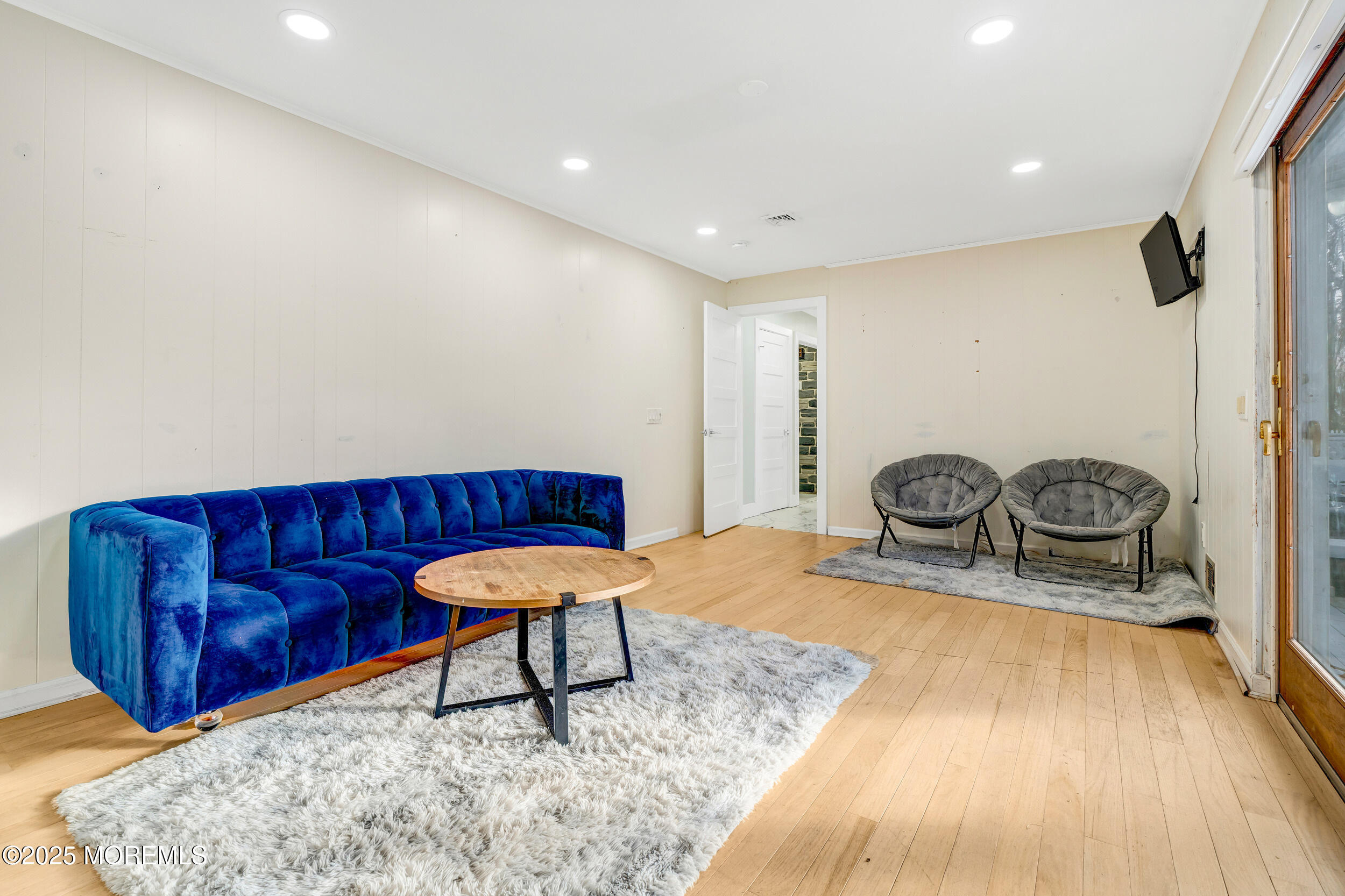 104 Pear Street Oakhurst, NJ 07755 - Photo 16 of 44 a living room with a couch and a coffee table