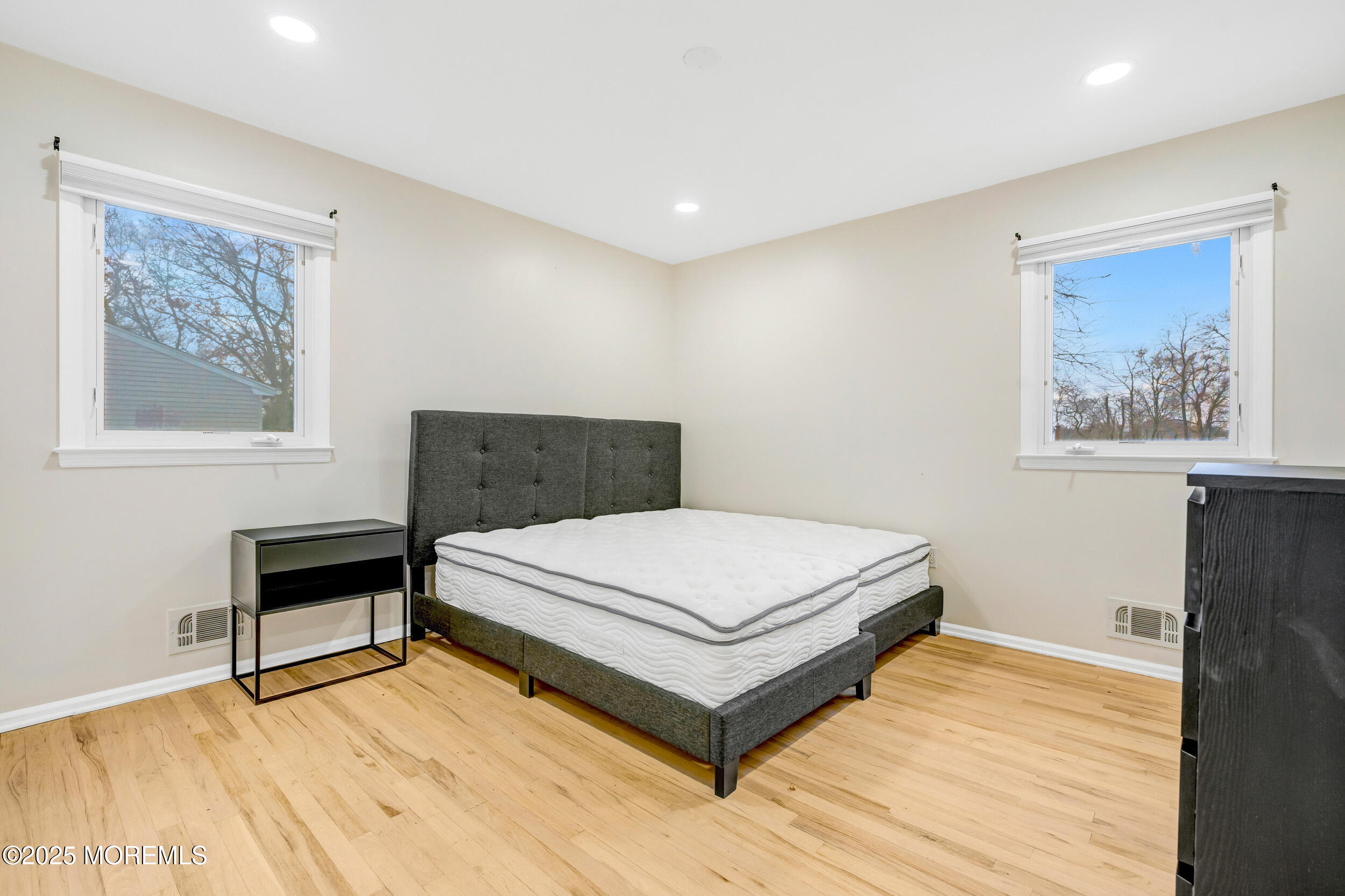 104 Pear Street Oakhurst, NJ 07755 - Photo 23 of 44 a bedroom with a bed and a window