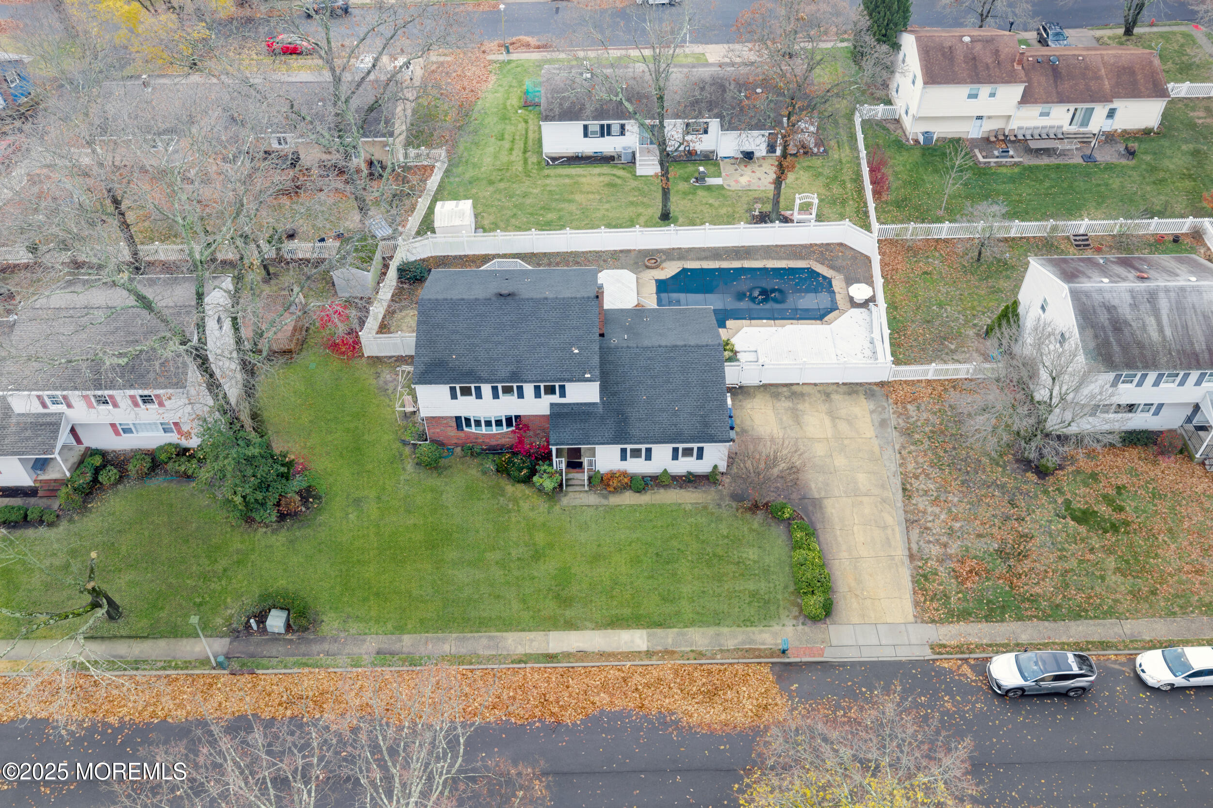 104 Pear Street Oakhurst, NJ 07755 - Photo 42 of 44 an aerial view of a house with a garden and lake view