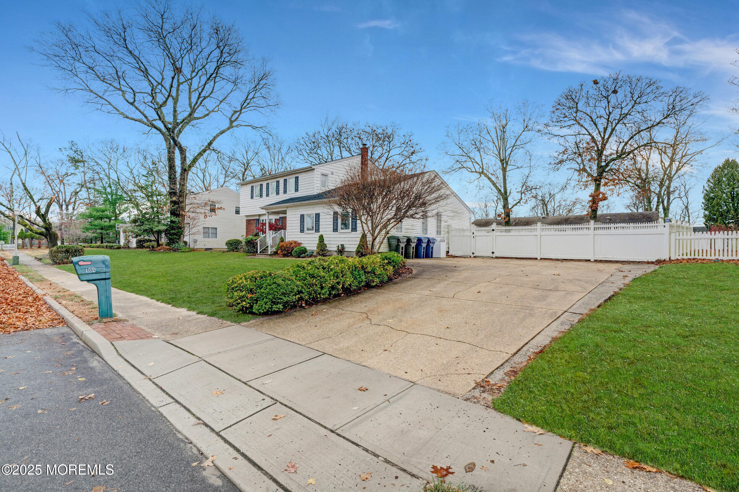 104 Pear Street Oakhurst, NJ 07755 - Photo 43 of 44 a view of house with yard and green space