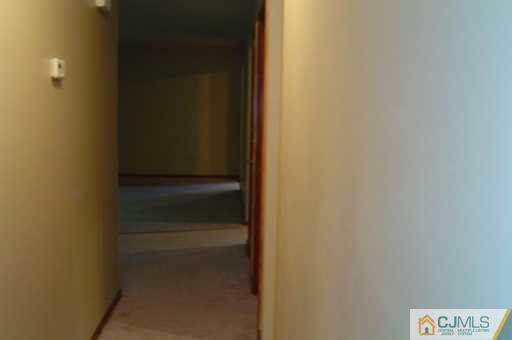870 New Dover Road Edison, NJ 08820 - Photo 3 of 8 a view of an empty walk in closet