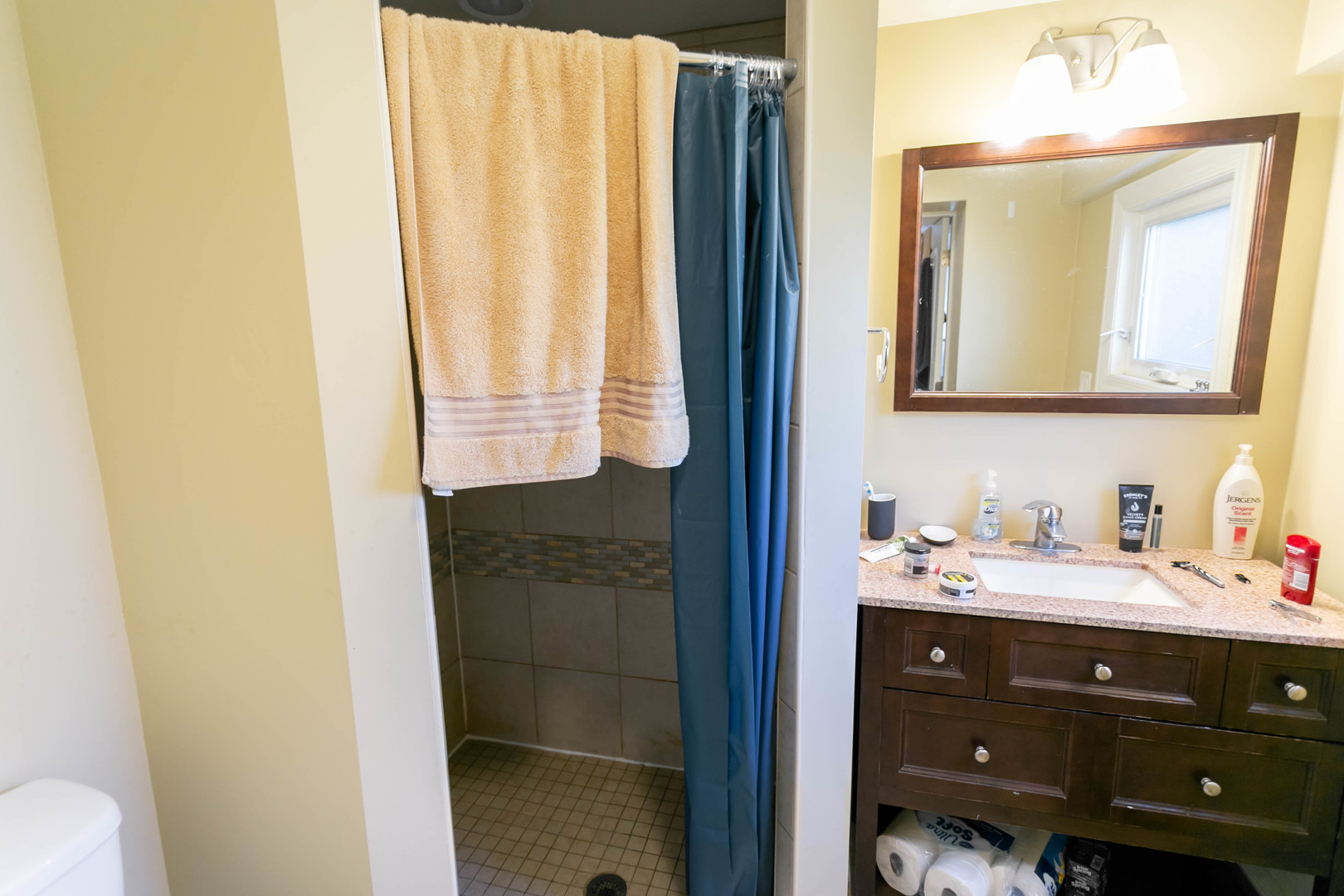 1623 West Huron Street, Unit 1R Chicago, IL 60622 - Photo 7 of 8 a bathroom with a sink vanity and a mirror