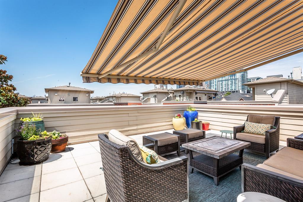 2226 City Market Lane Dallas, TX 75201 - Photo 2 of 40 a roof deck with couch and chairs