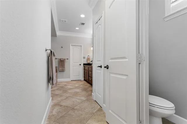 a bathroom with a sink and toilet