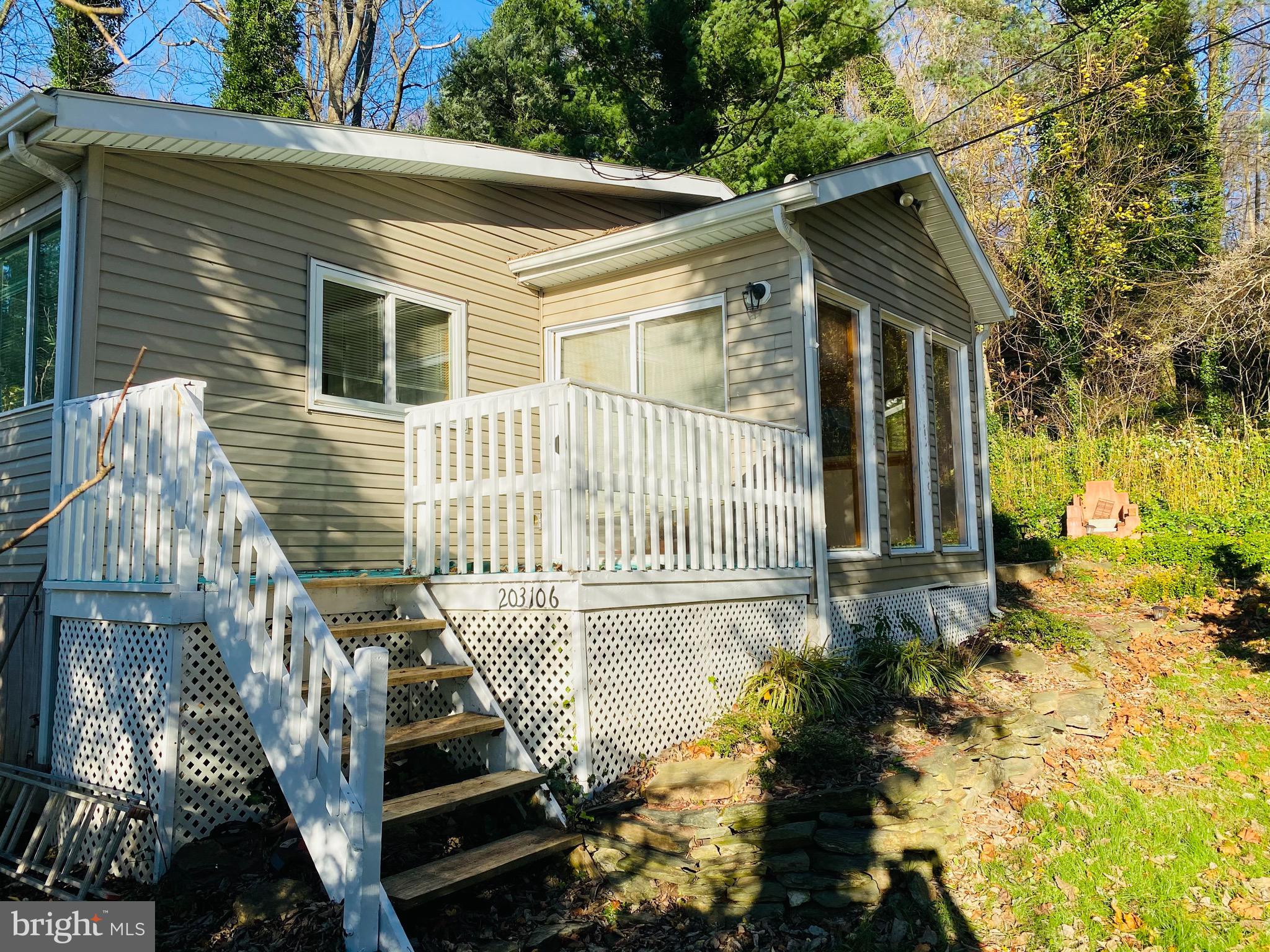 489 Peach Bottom Road Peach Bottom, PA 17563 - Photo 2 of 32 Side Of Home With Steps Leading To The Deck
