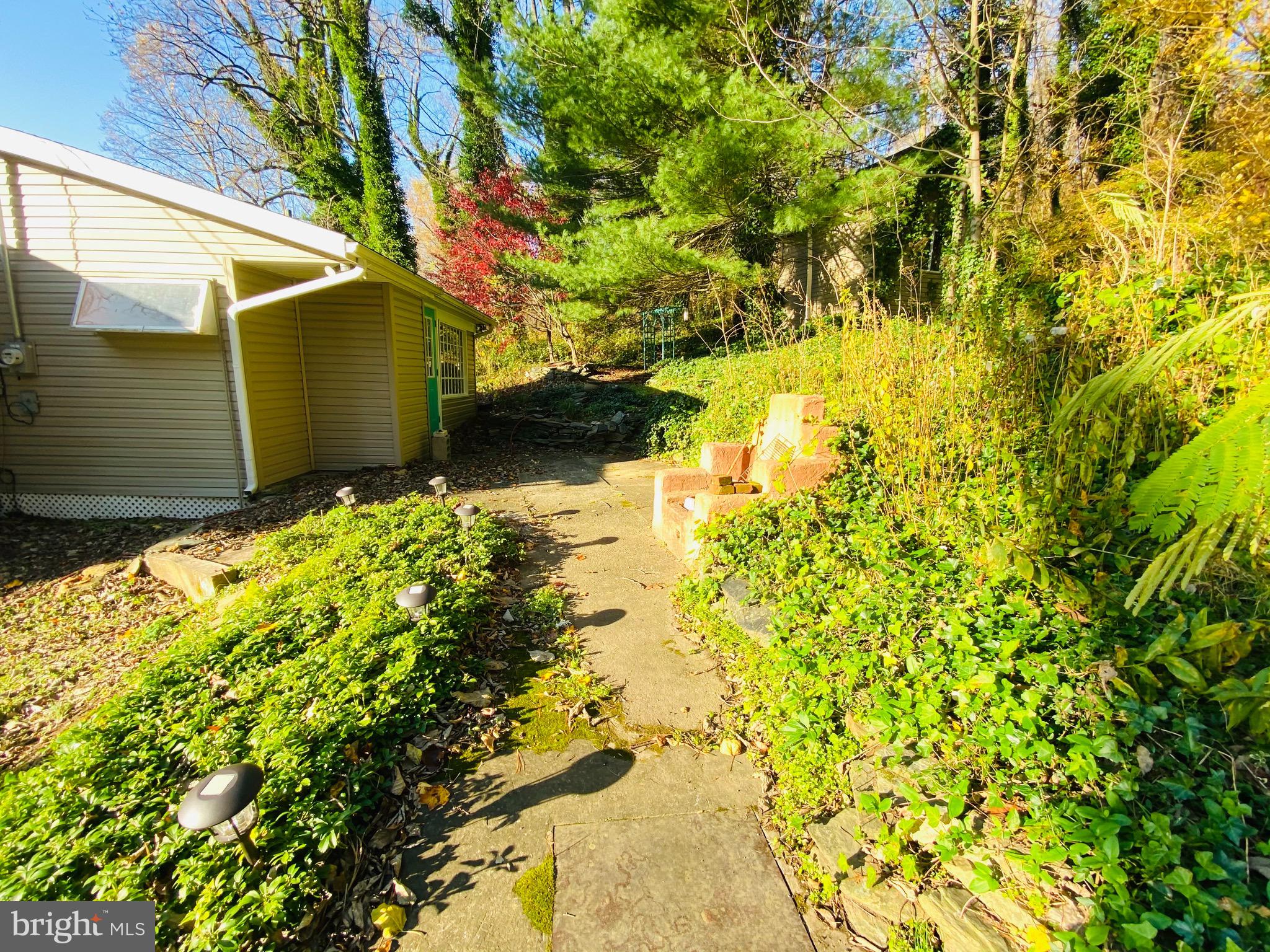489 Peach Bottom Road Peach Bottom, PA 17563 - Photo 6 of 32 Pathway Leading To Home, With Firepit To the Right