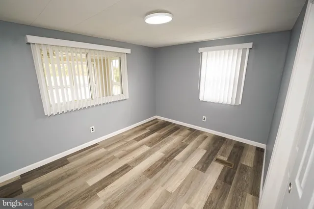 a view of a room that has a window in it