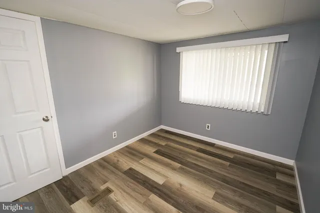 a view of a room with a window