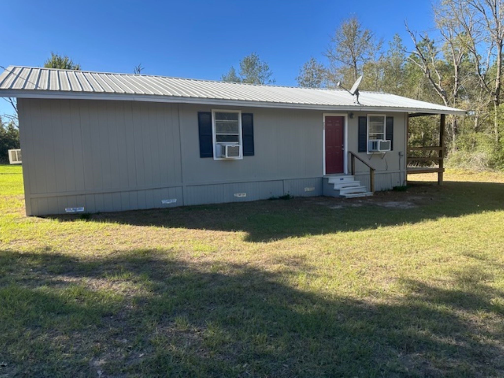 593 County Road 4050 Lovelady, TX 75851 - Photo 1 of 9 a front view of a house with yard