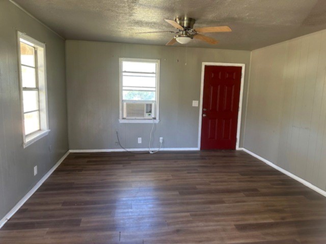 593 County Road 4050 Lovelady, TX 75851 - Photo 3 of 9 a view of an empty room with wooden floor and a window
