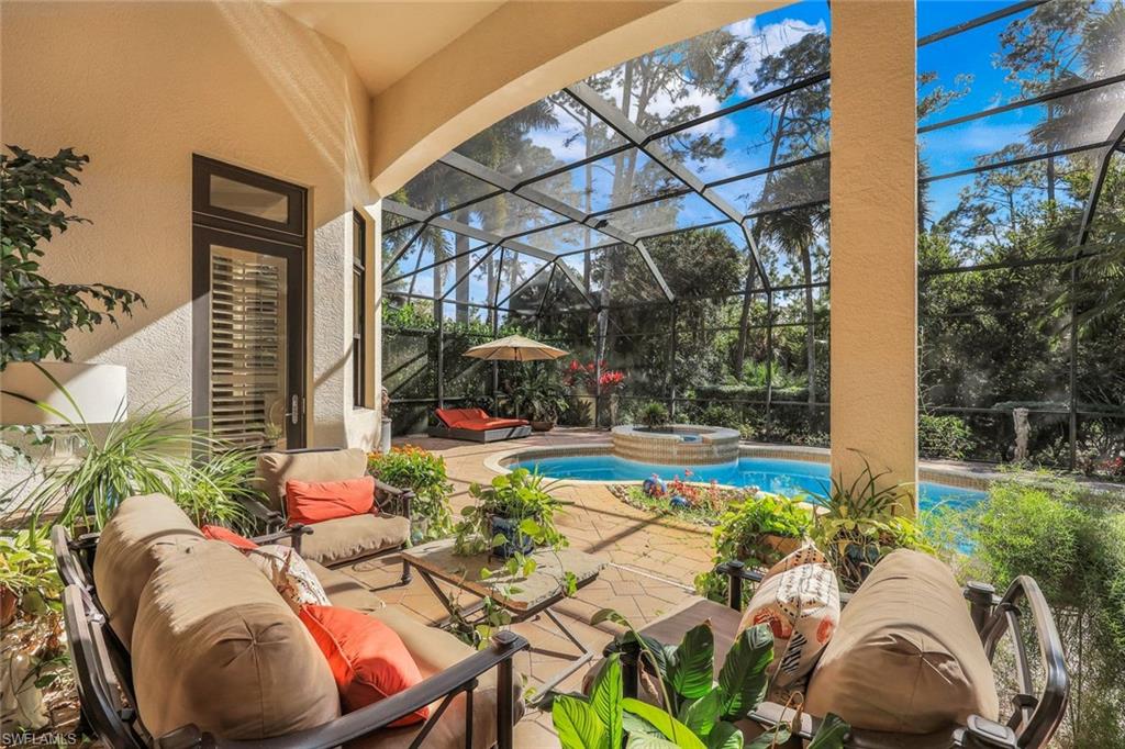 18051 Lagos Way Naples, FL 34110 - Photo 25 of 35 a view of yard with patio