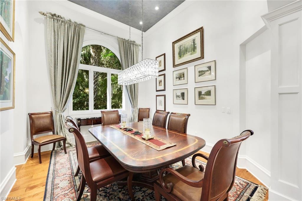 18051 Lagos Way Naples, FL 34110 - Photo 6 of 35 a view of a dining room with furniture and window