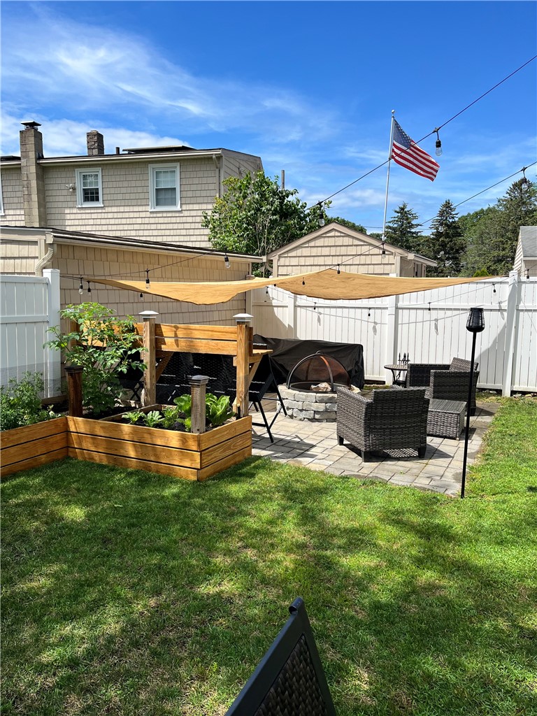 10 Cosett Road Warwick, RI 02886 - Photo 31 of 31 Garden beds & patio in summer