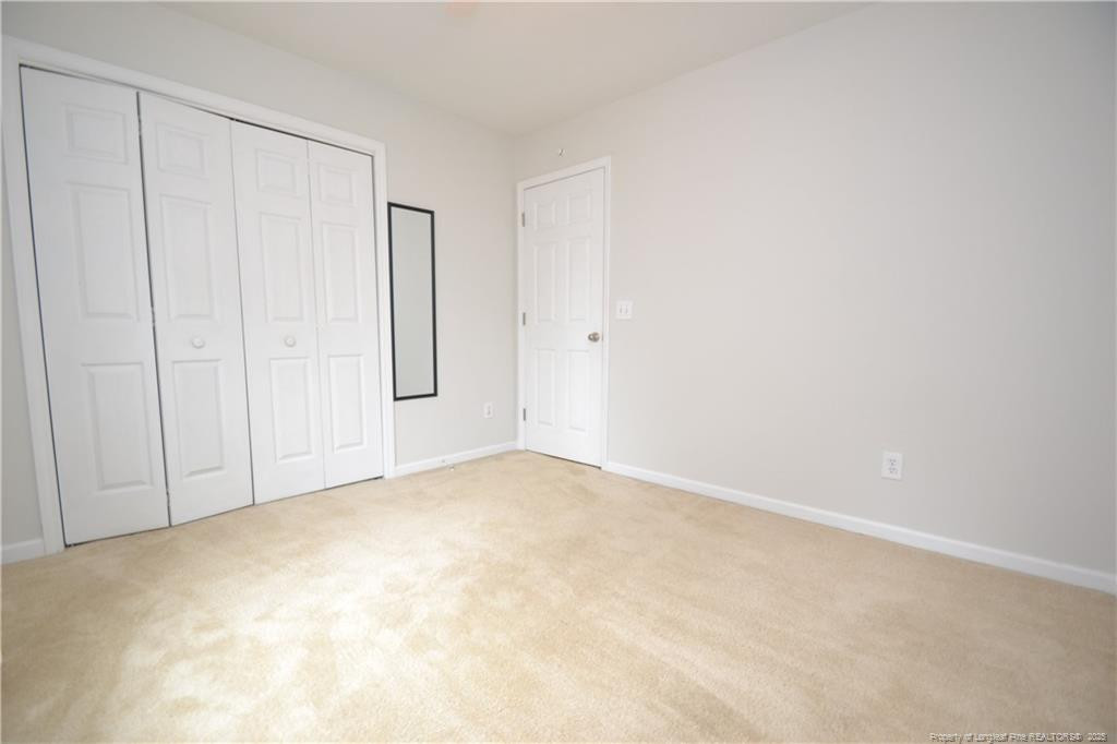 6061 Epping Forest Drive Raleigh, NC 27613 - Photo 18 of 37 a view of an empty room