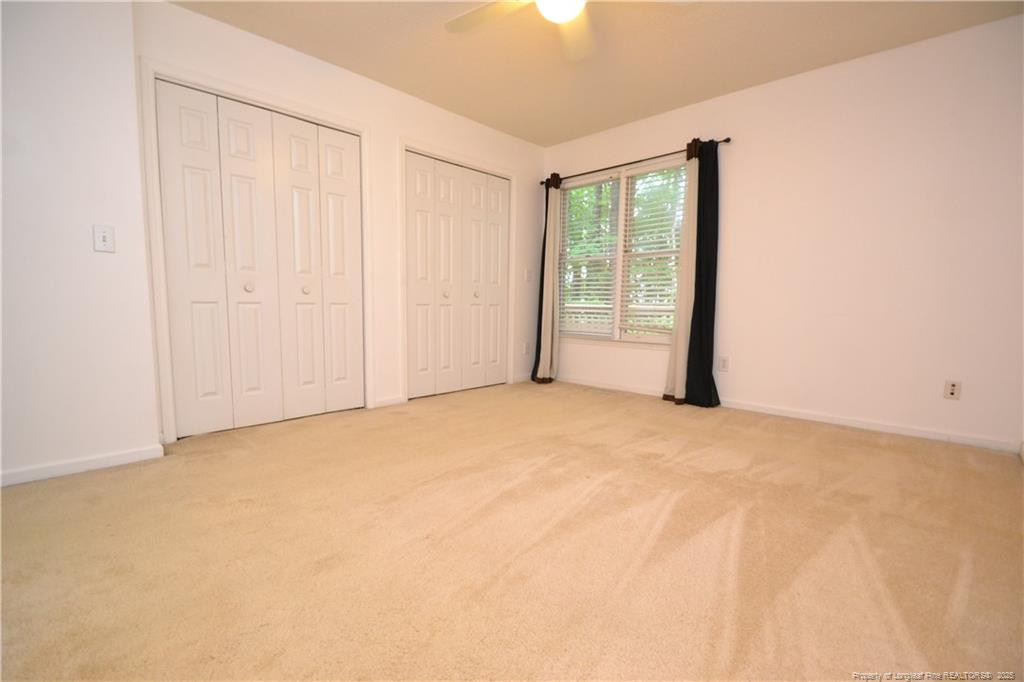 6061 Epping Forest Drive Raleigh, NC 27613 - Photo 23 of 37 a view of an empty room with a window