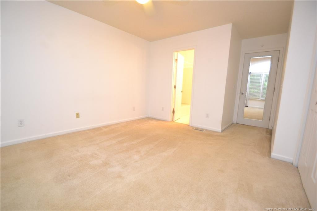 6061 Epping Forest Drive Raleigh, NC 27613 - Photo 25 of 37 an empty room with closet area