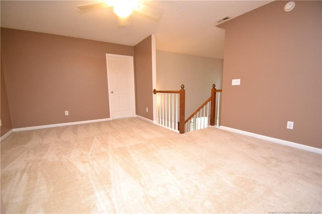 6061 Epping Forest Drive Raleigh, NC 27613 - Photo 31 of 37 a view of an empty room