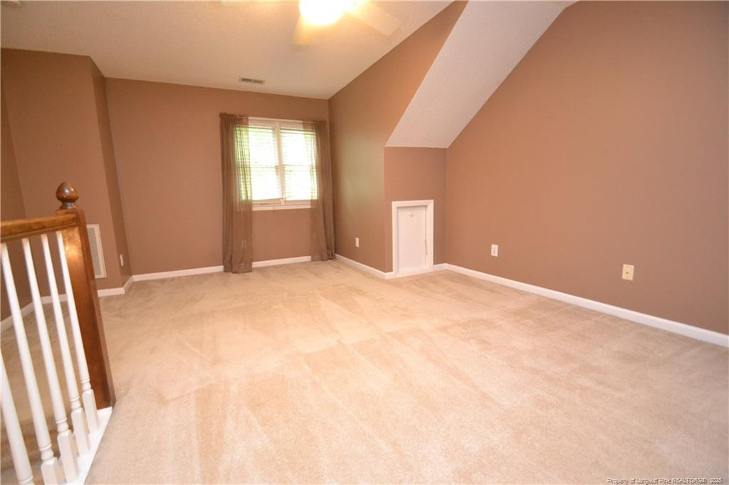 6061 Epping Forest Drive Raleigh, NC 27613 - Photo 33 of 37 a view of an empty room with a window