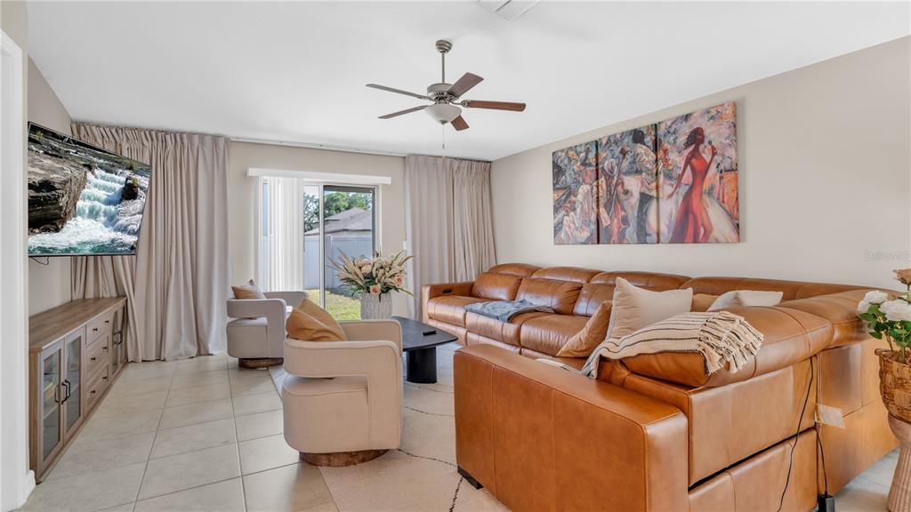 1841 Crinkle Leaf Court Ruskin, FL 33570 - Photo 6 of 35 a living room with furniture and a couch