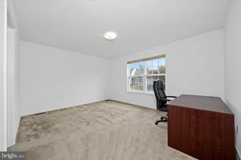 a view of a room with a window