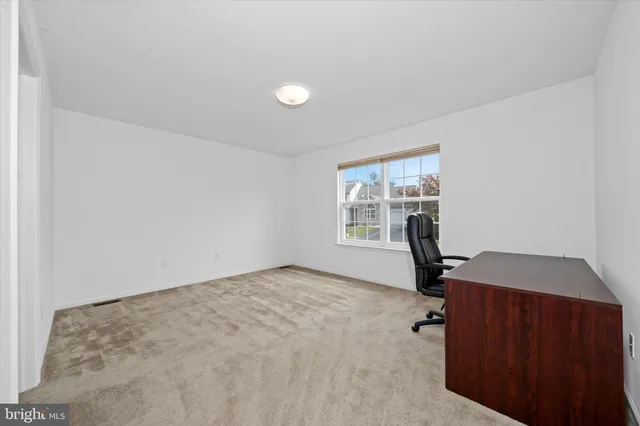 a view of a room with a window