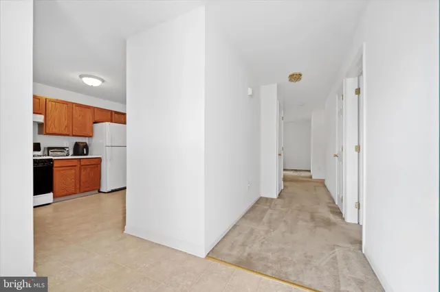 a view of a kitchen with a sink