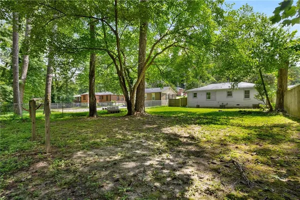 a house view with a garden space