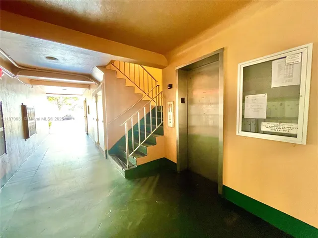 a view of a cars parked in front of a building