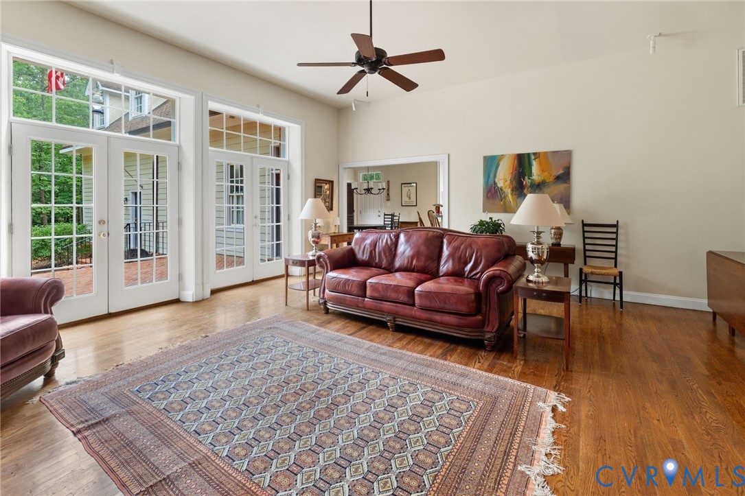 13173 Scotchtown Road Beaverdam, VA 23015 - Photo 21 of 65 a living room with furniture and a rug