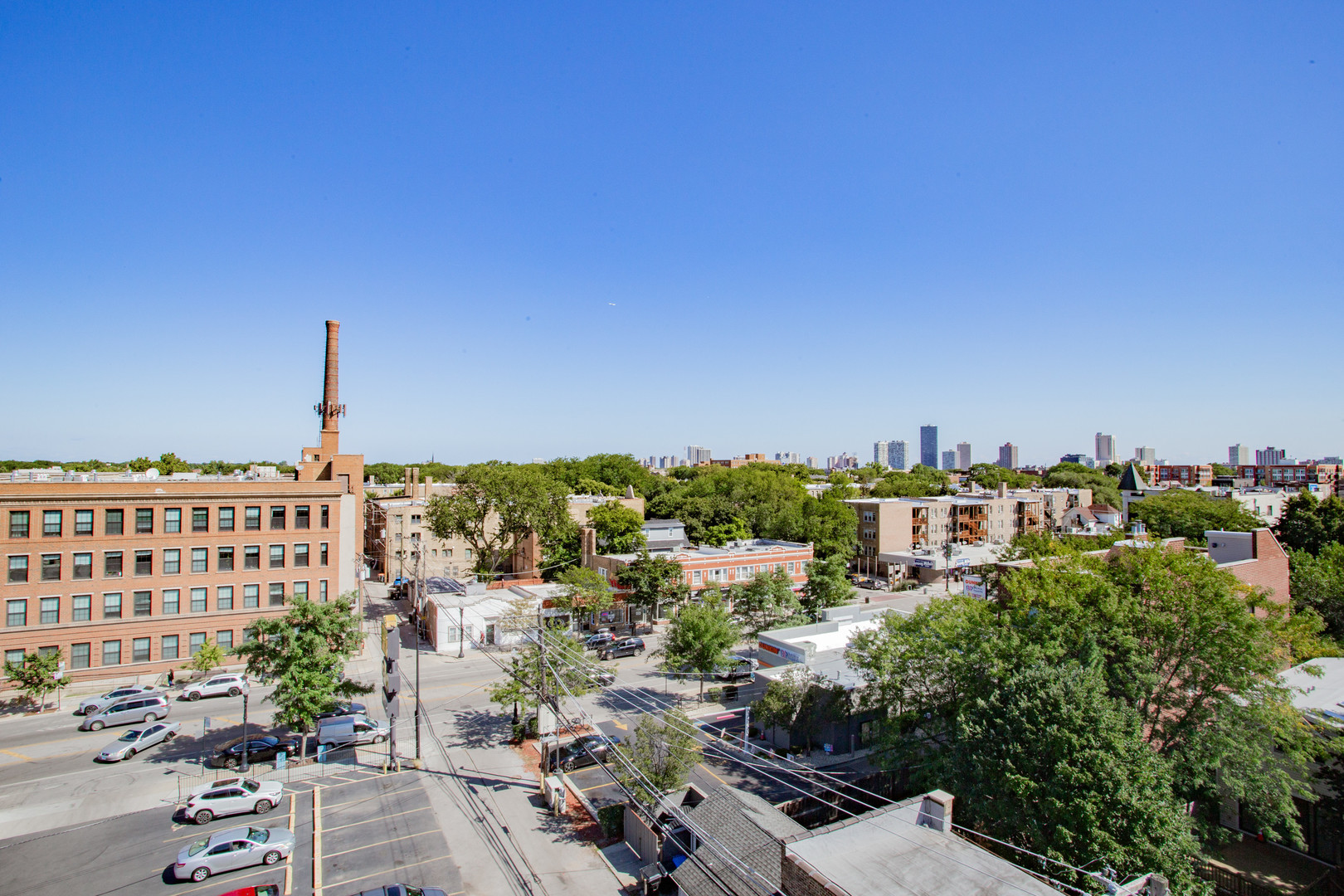 4745 North Ravenswood Avenue, Unit 210 Chicago, IL 60640 - Photo 18 of 23 a view of a city with tall buildings