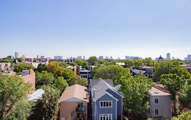 a view of a balcony with chairs