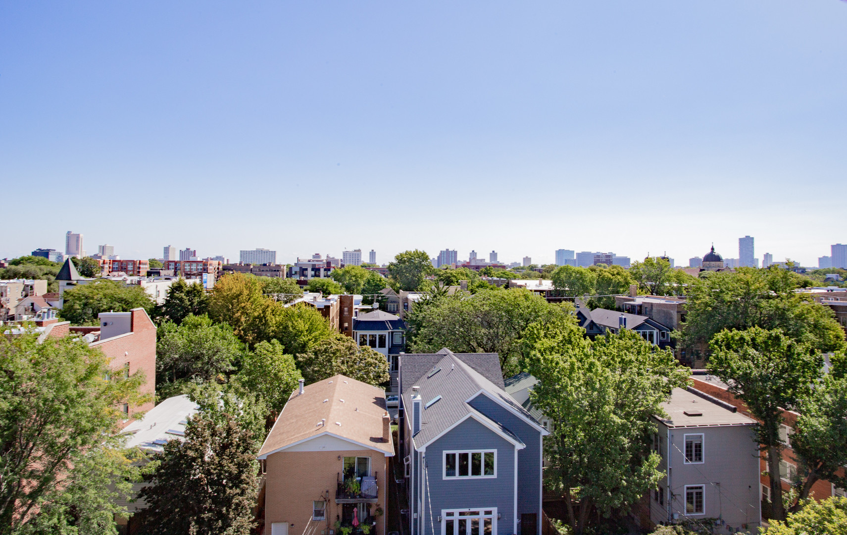 4745 North Ravenswood Avenue, Unit 210 Chicago, IL 60640 - Photo 19 of 23 a view of a city with a building in the background